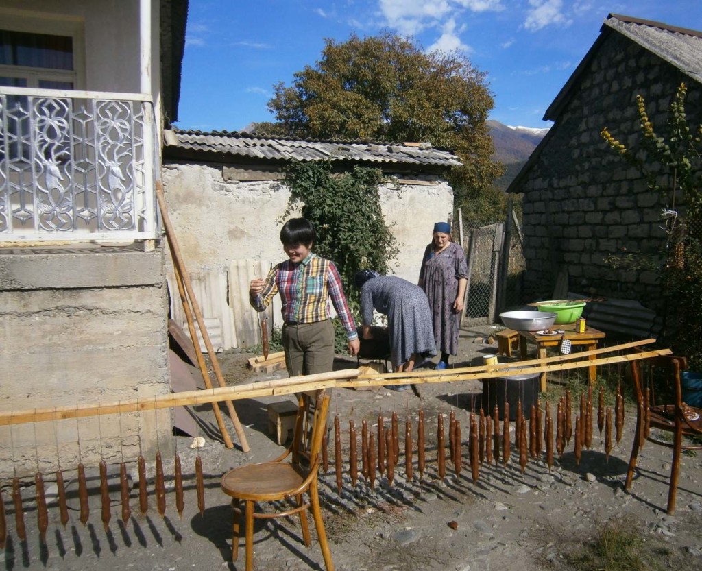 Hanging Churchkhela to dry in sun